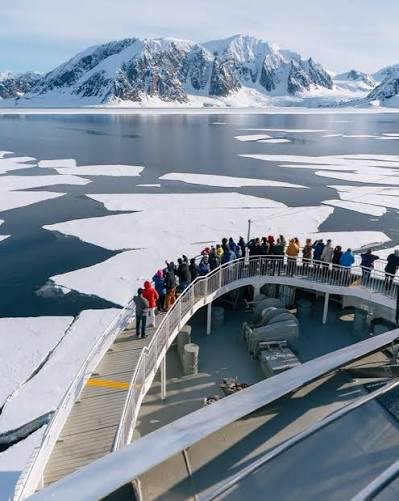 Disembark in Longyearbyen and fly to Helsinki
